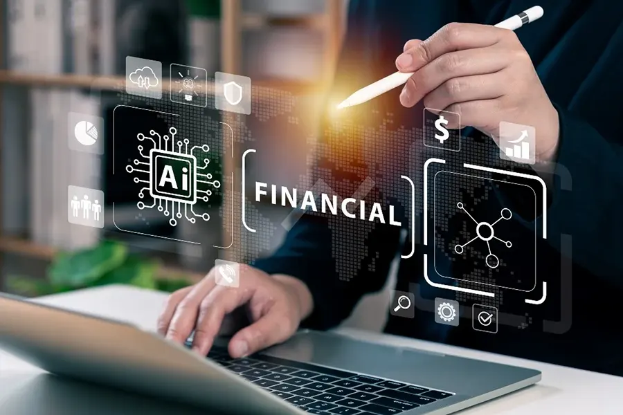 A person using a laptop with holographic financial and AI icons, such as an AI chip, a dollar sign, and data visualisations. The word 'FINANCIAL' is displayed prominently, with the individual interacting with the digital interface using a stylus, symbolising the integration of AI in financial services.