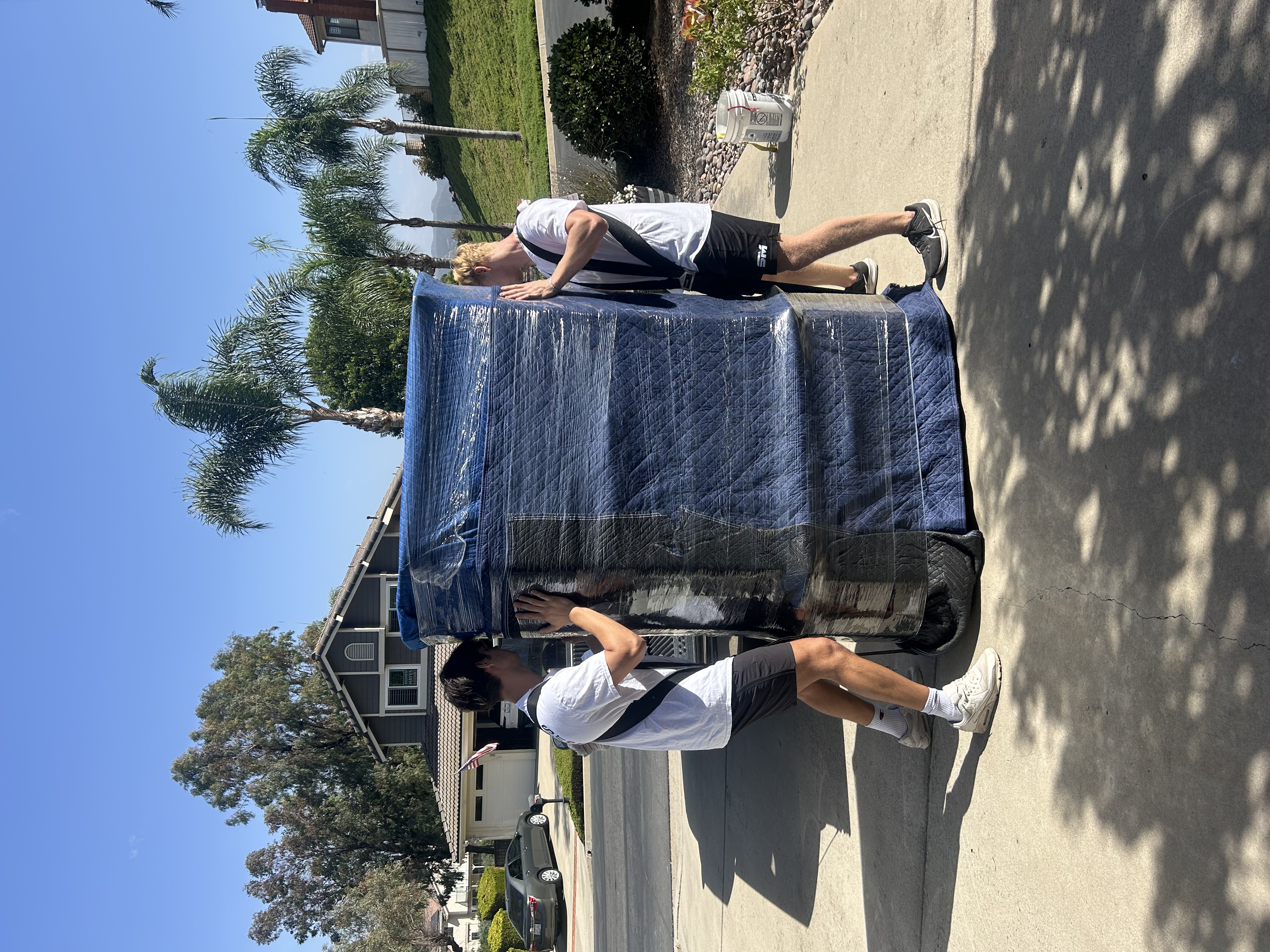 Labor only movers loading rental truck San Diego