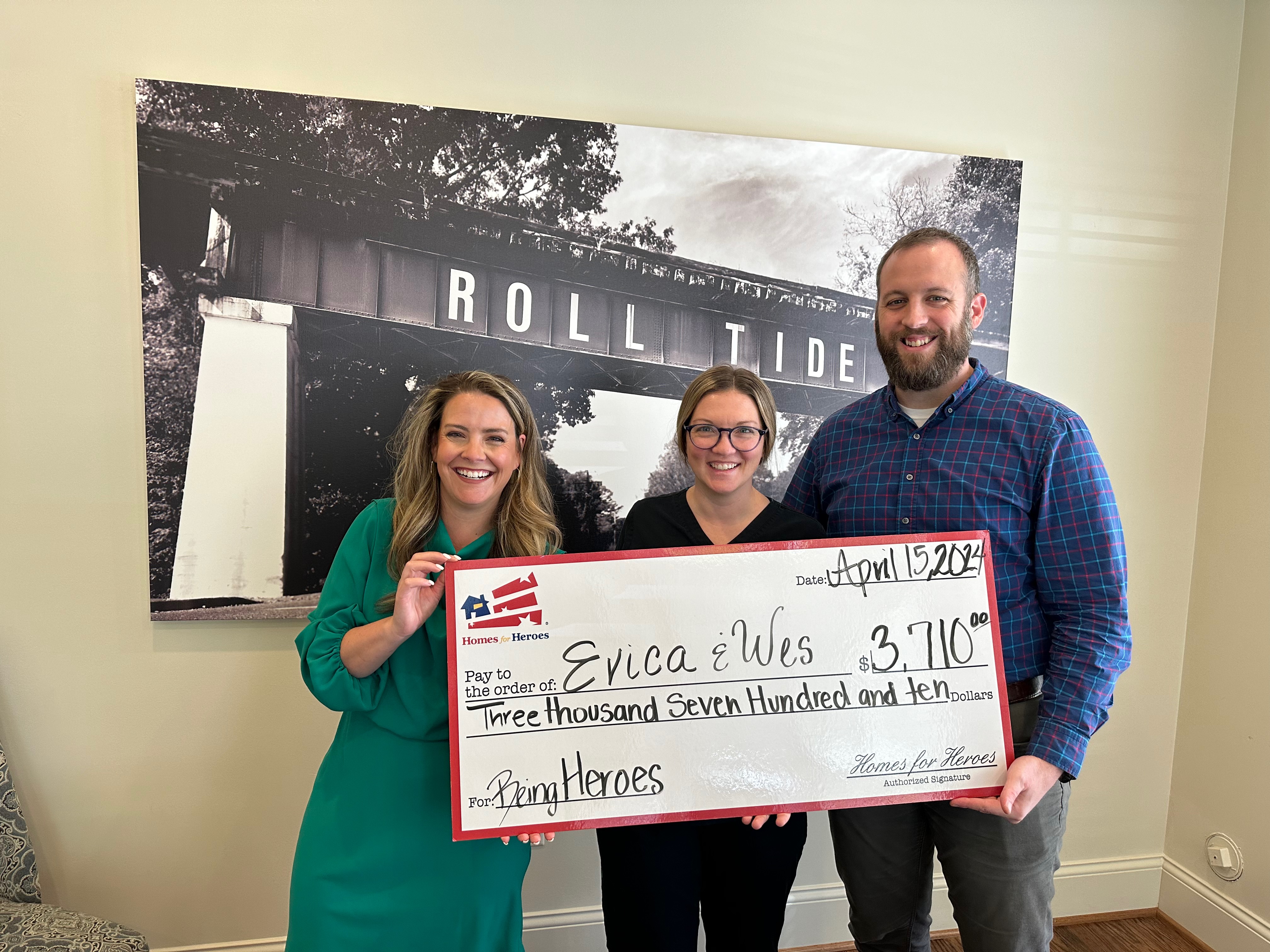 Nurse and teacher clients celebrating money back after buying a home in Northport Alabama