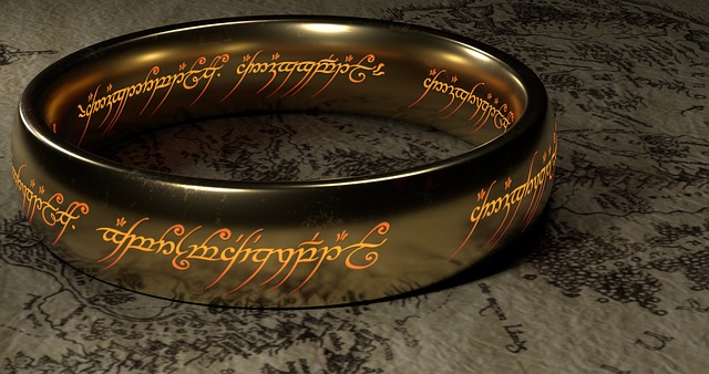 image is of a golden ring with writing