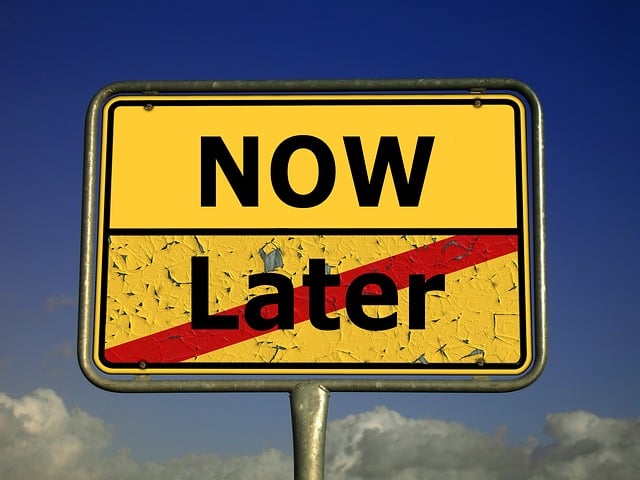 image of yellow sign now and later, with later crossed out
