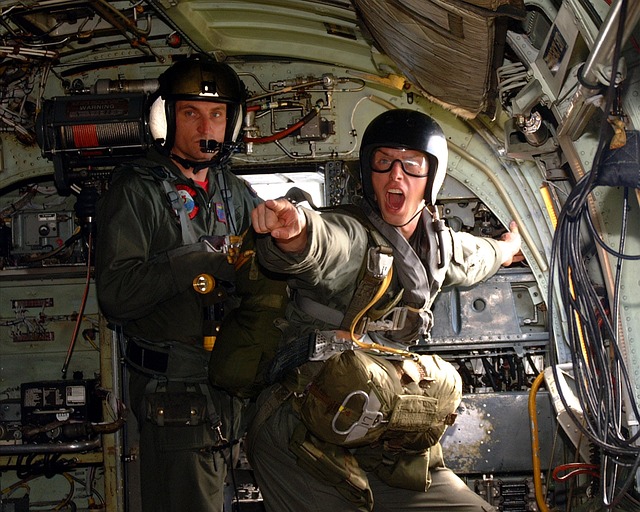 image of two men getting ready to skydive