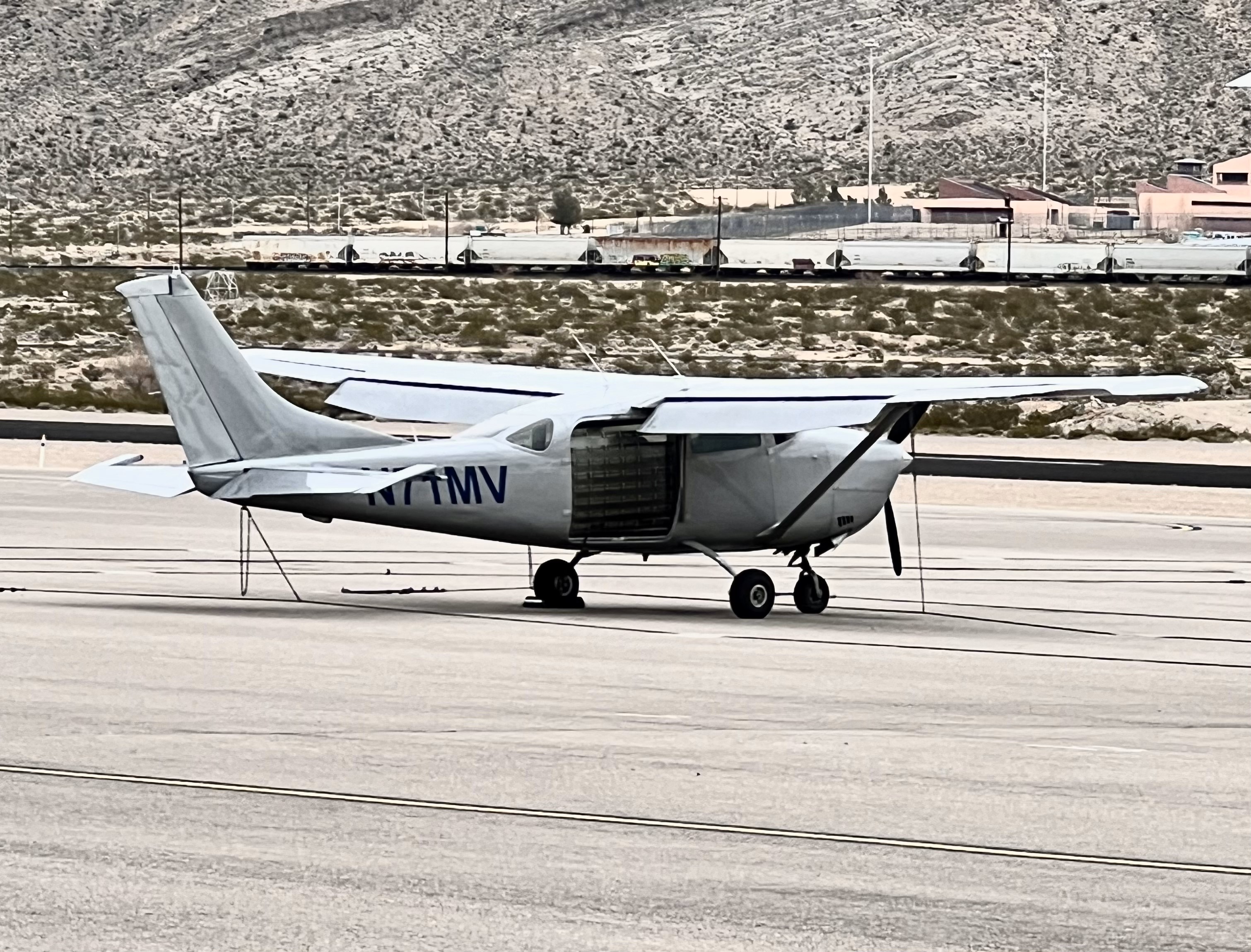 image of a small plane sitting on the runway