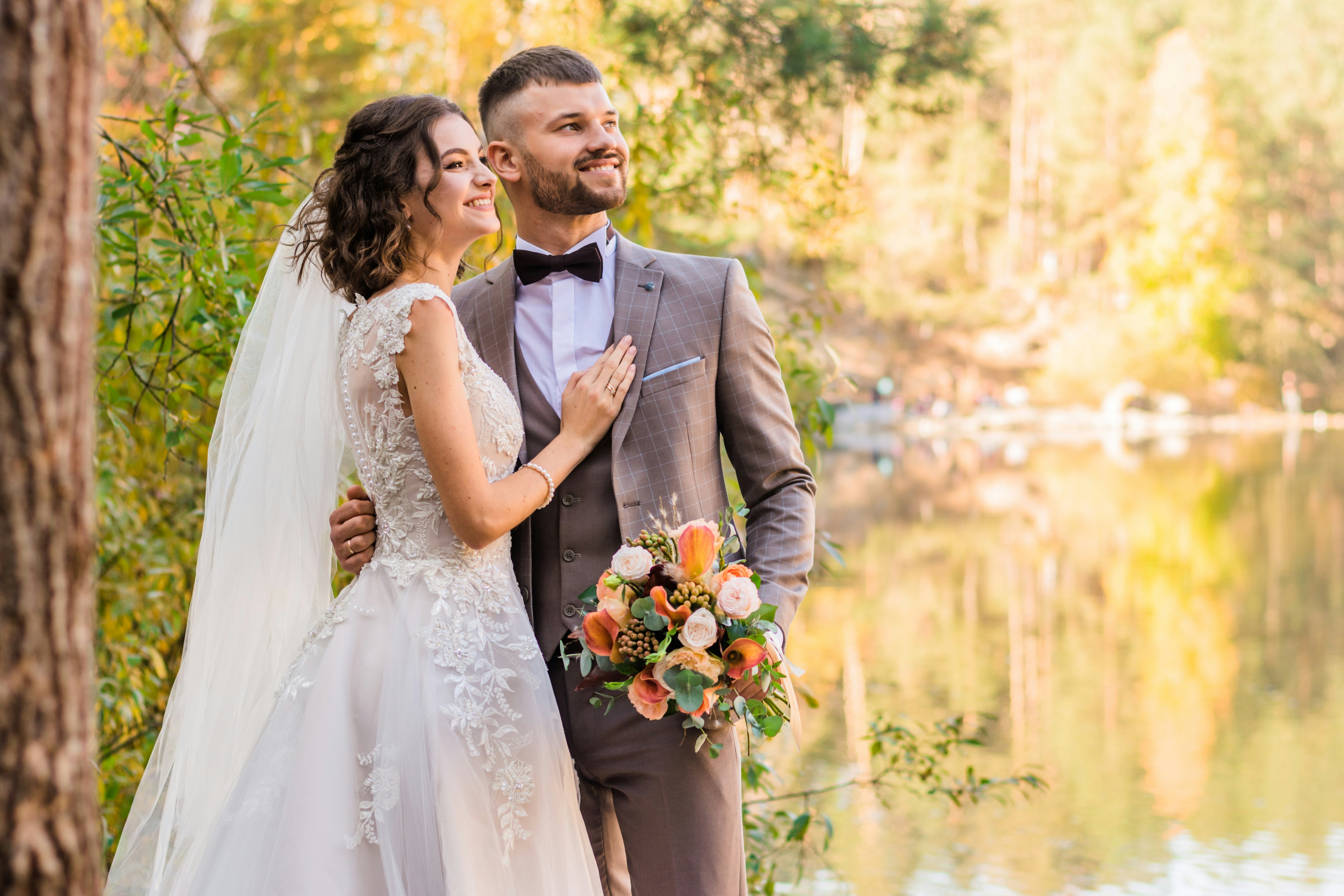 Wedding couple outside celebrating