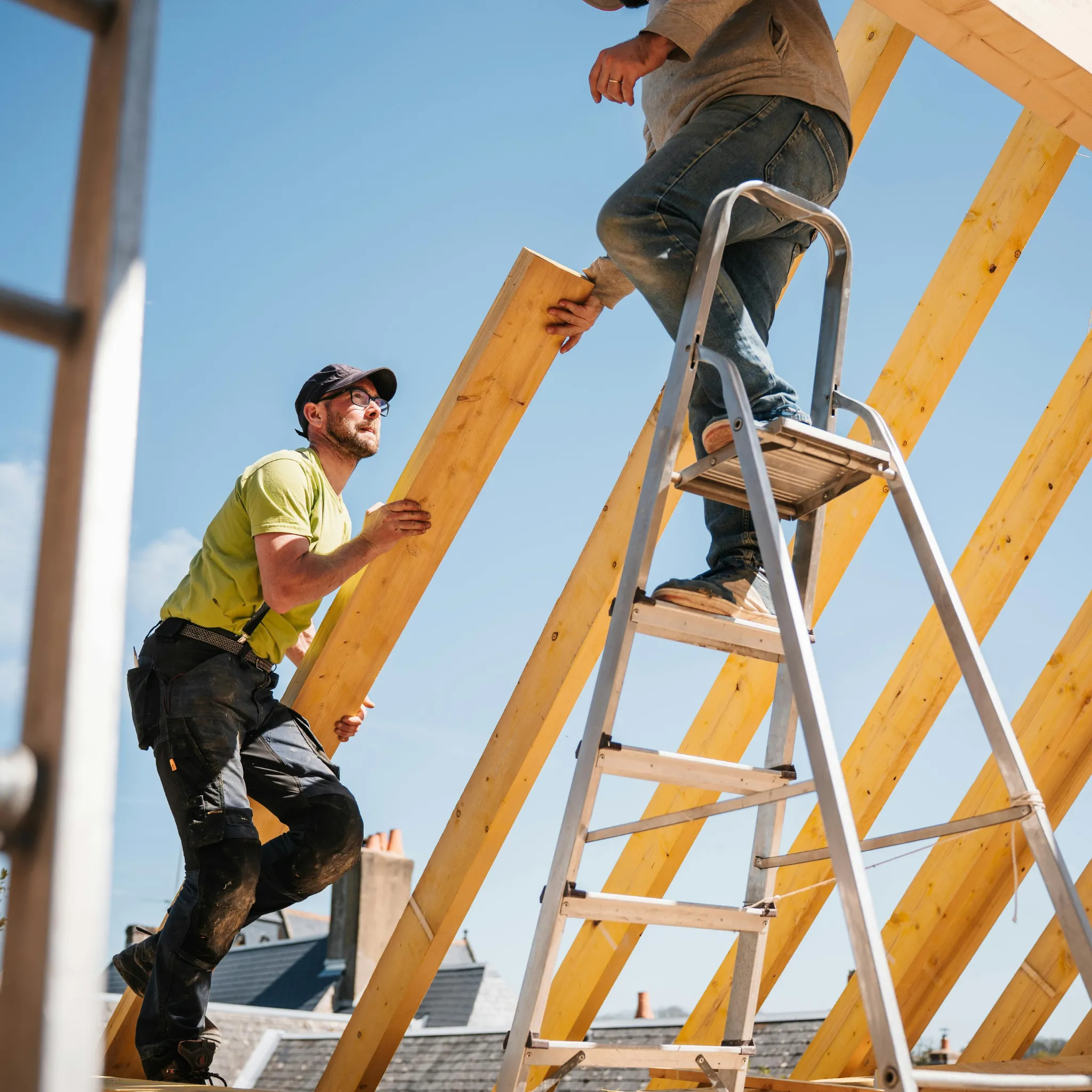 A construction site with a new roof being installed.
