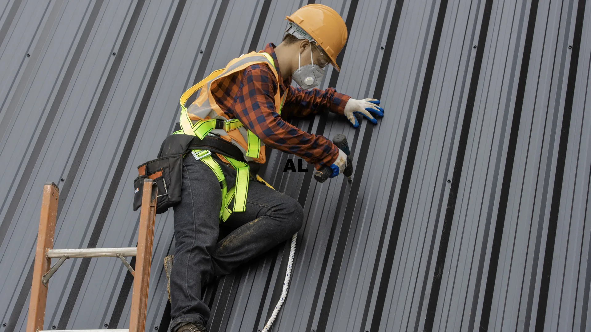A professional installing a TPO flat roofing system.