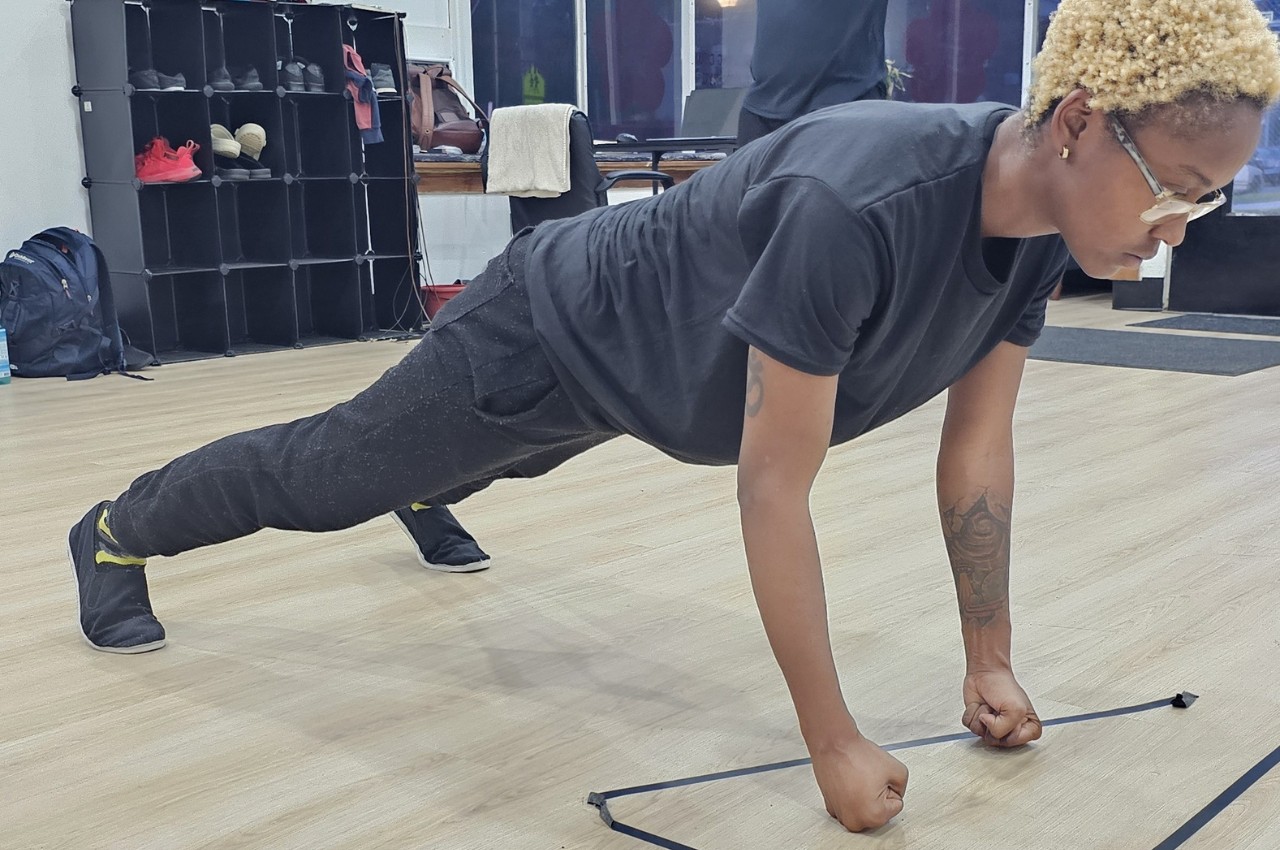 Martial arts instructor with kids