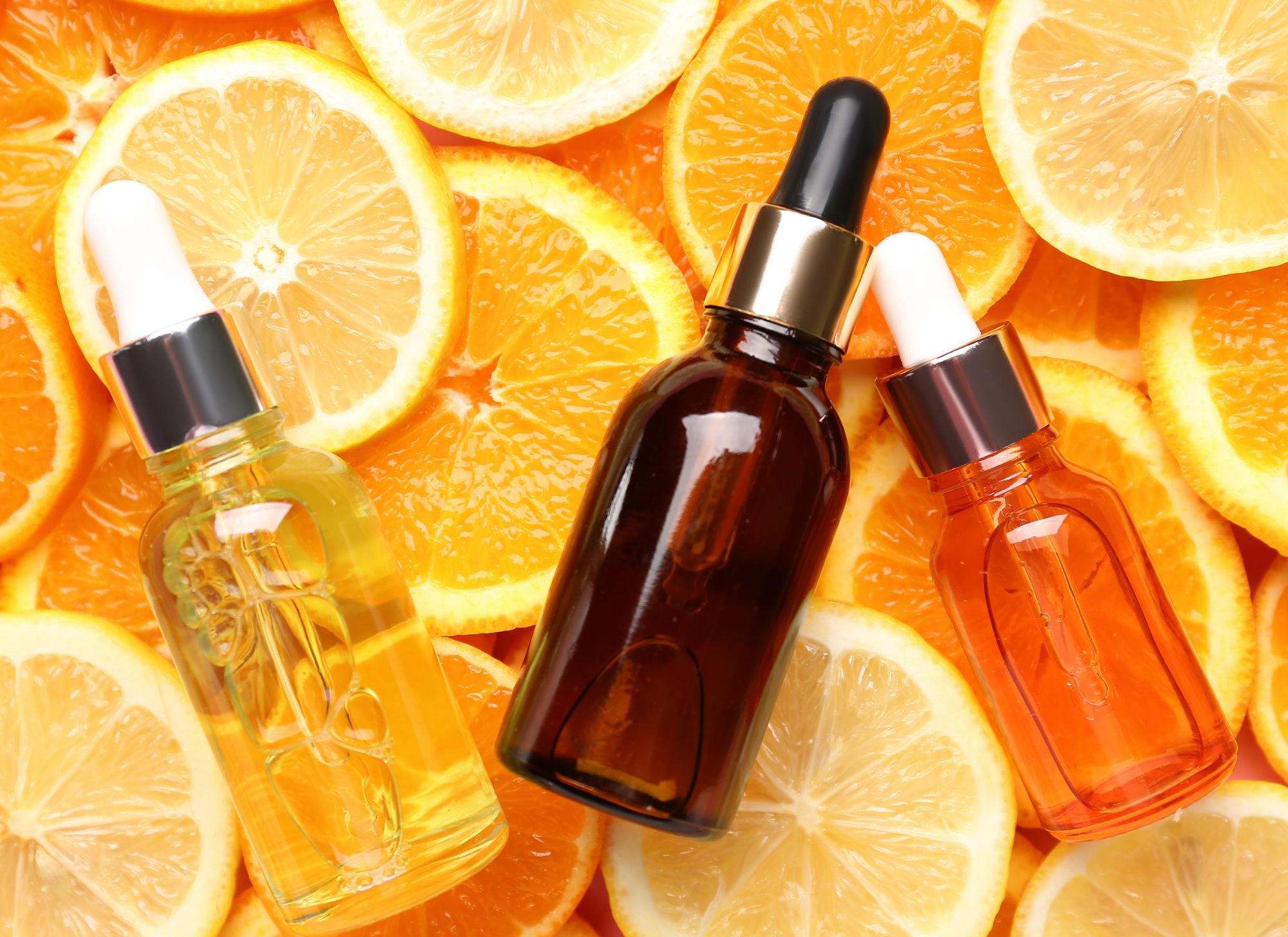 citrus fruit and essential oil bottles