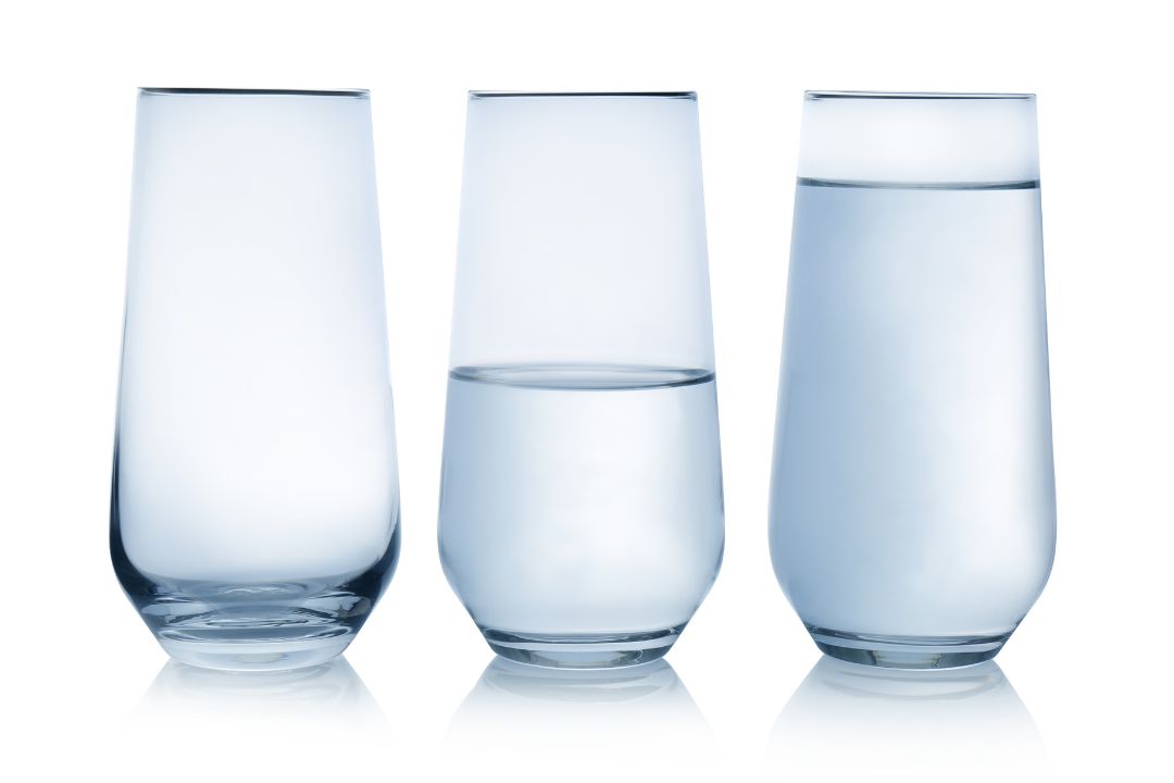 Empty, half, and full glasses of water Empty, half, and full glasses of water