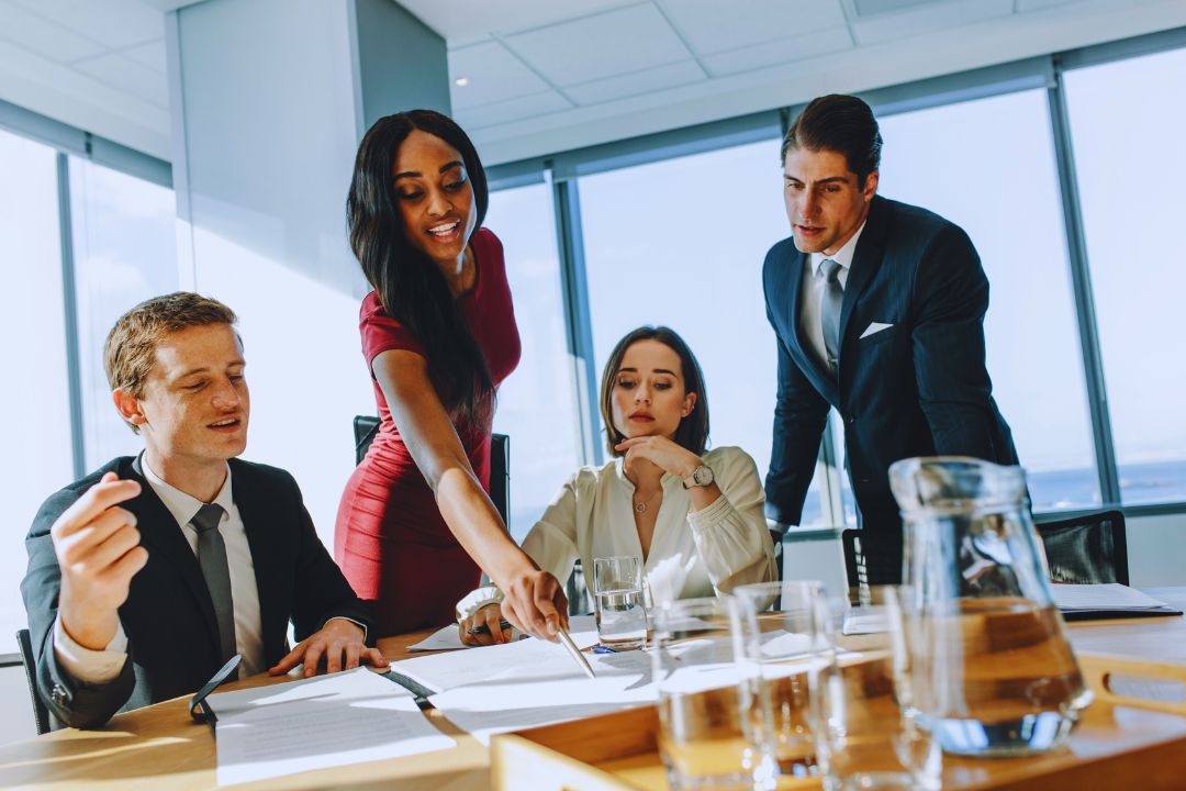 Corporate professionals in a meeting Corporate professionals in a meeting