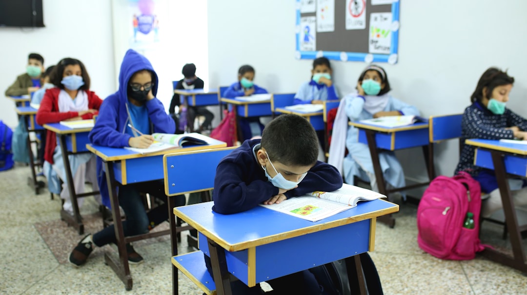 kids in classroom with mask on kids in classroom with mask on