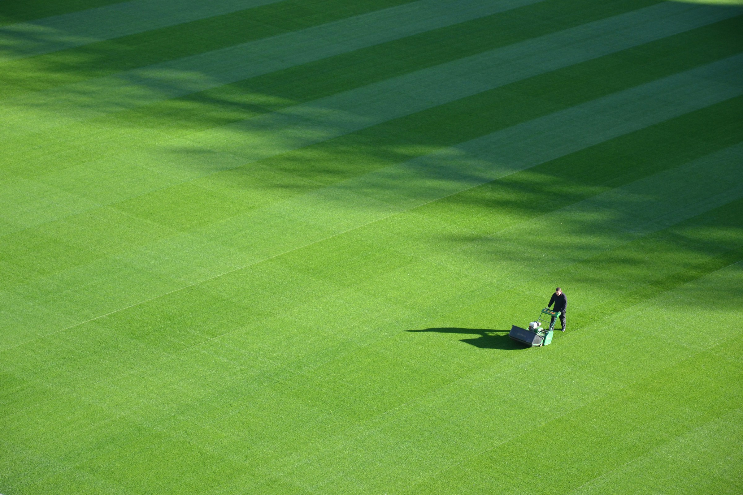 Mowing a large area of grass