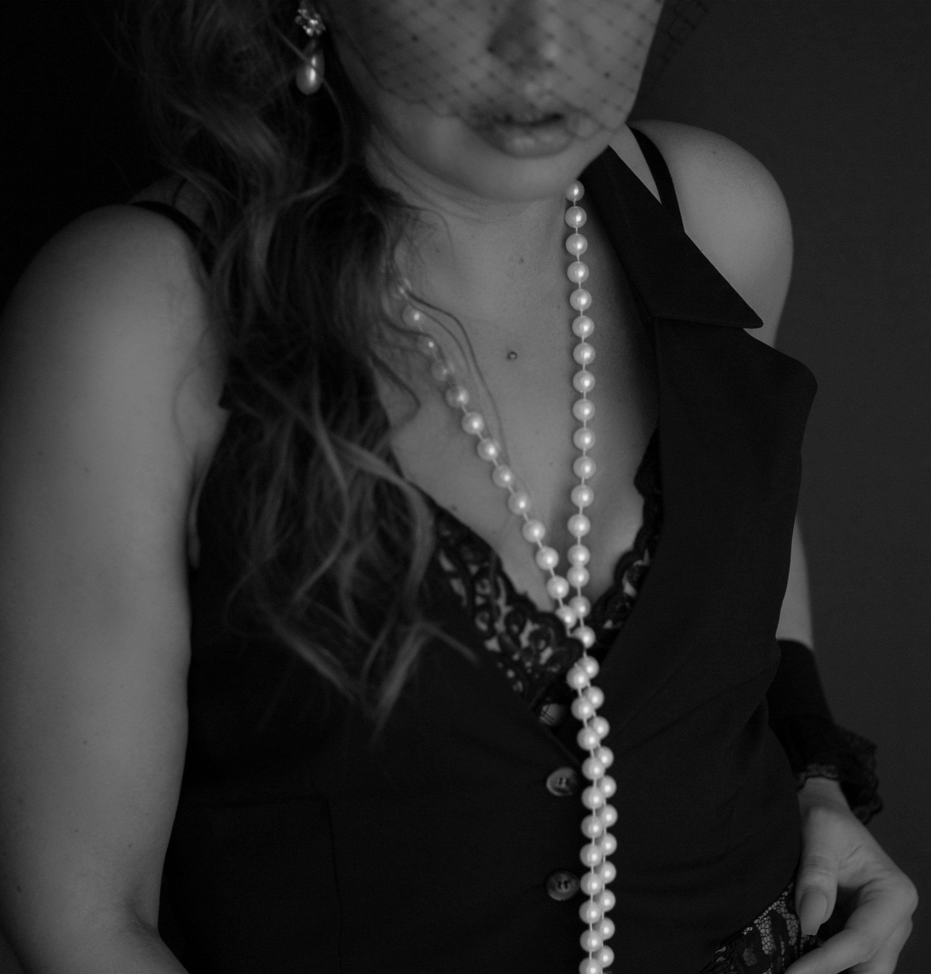 Women in pearls and lingerie