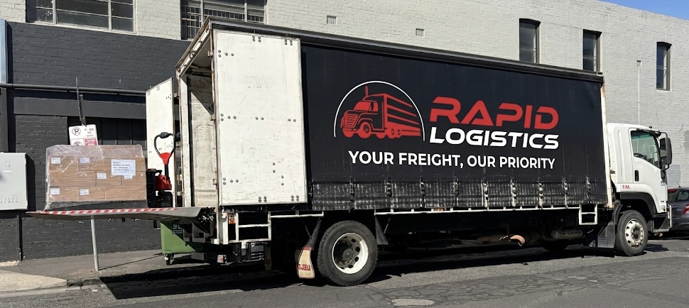 No Forklift, No Problem we have Tailgate Service with Electric Pallet Jack