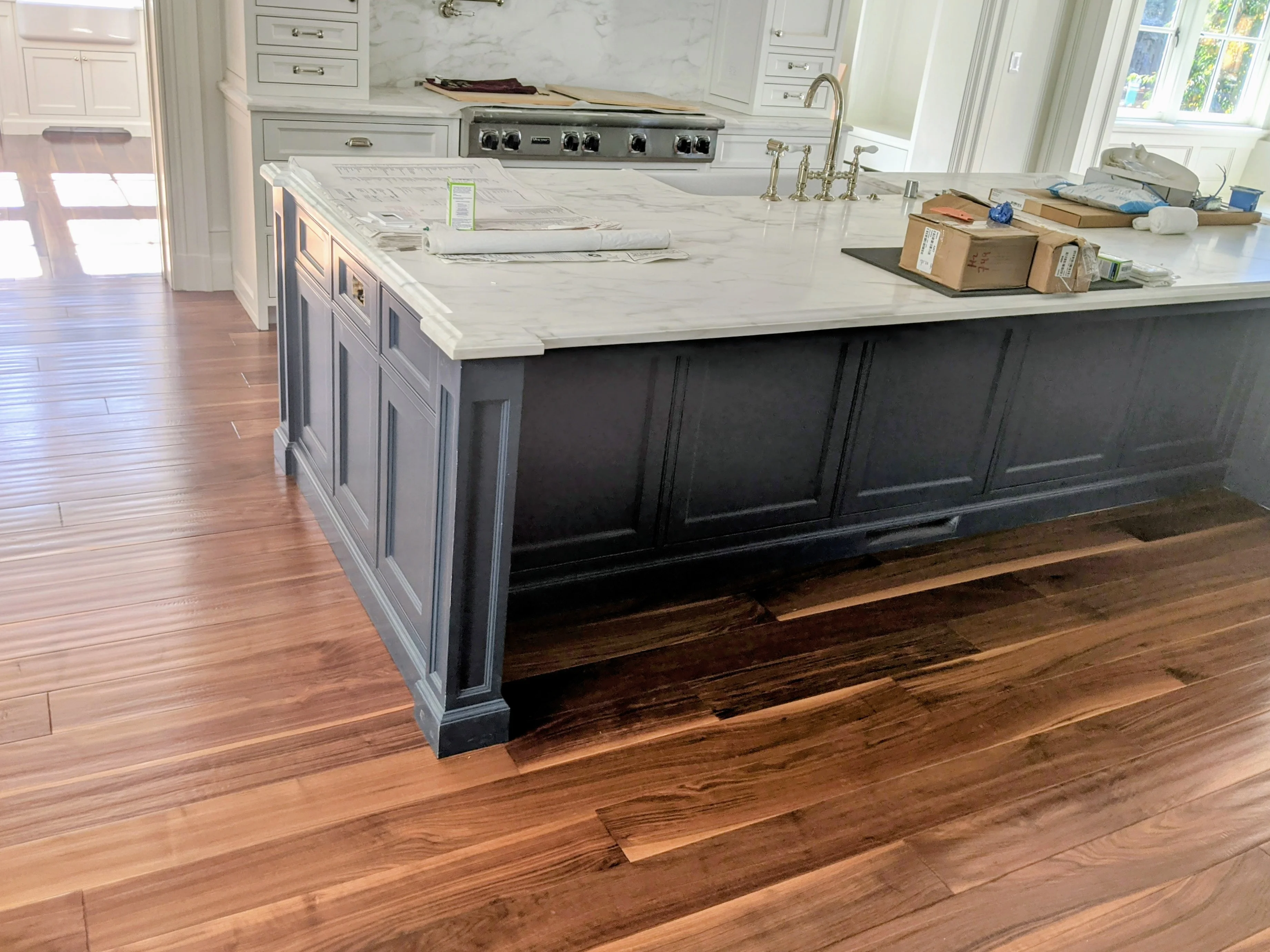 Professional hardwood floor installation in progress