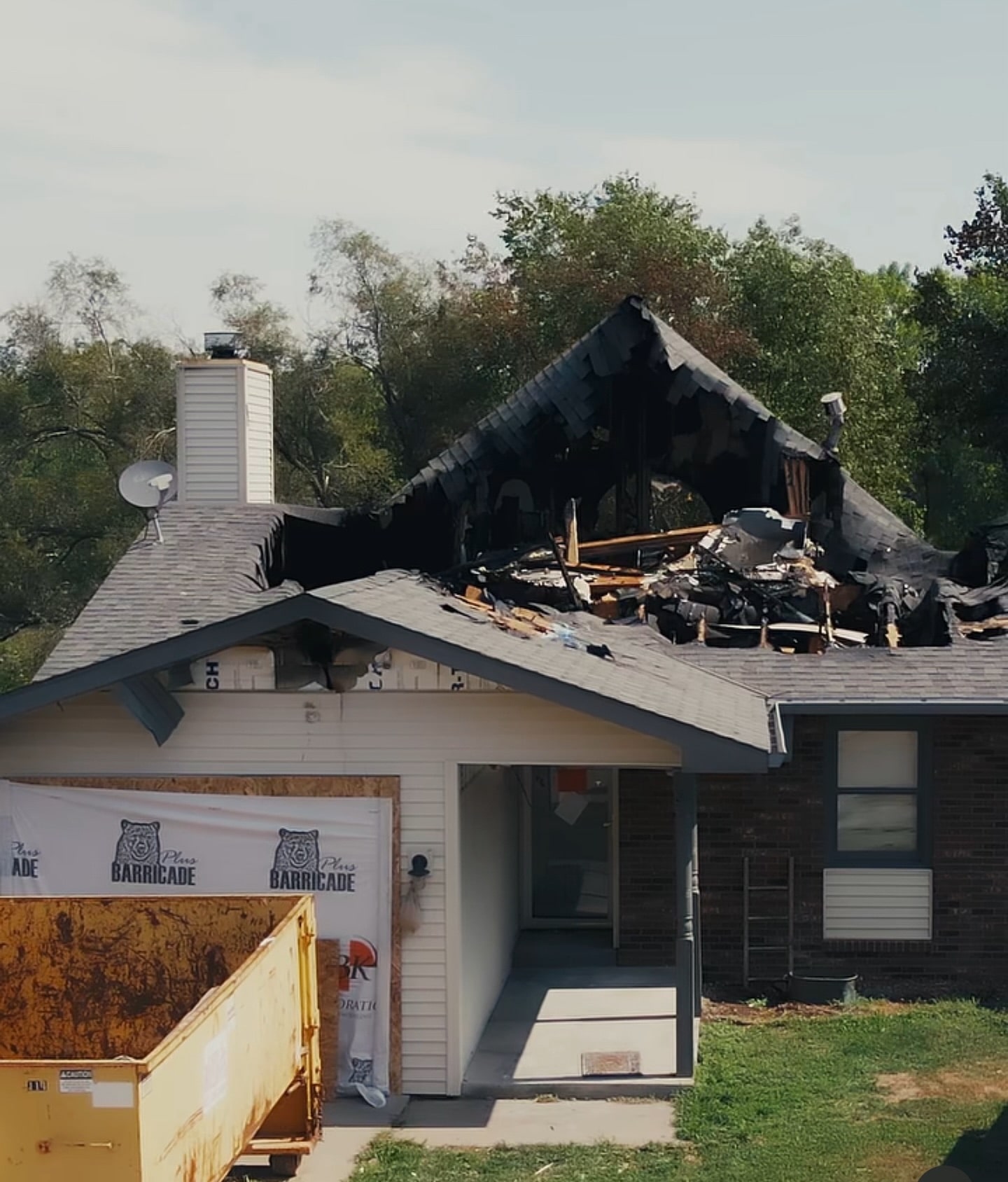 a house with a burnt roof