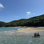 caribbean water and lush mountains