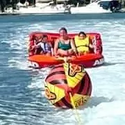 people tubing in the ocean