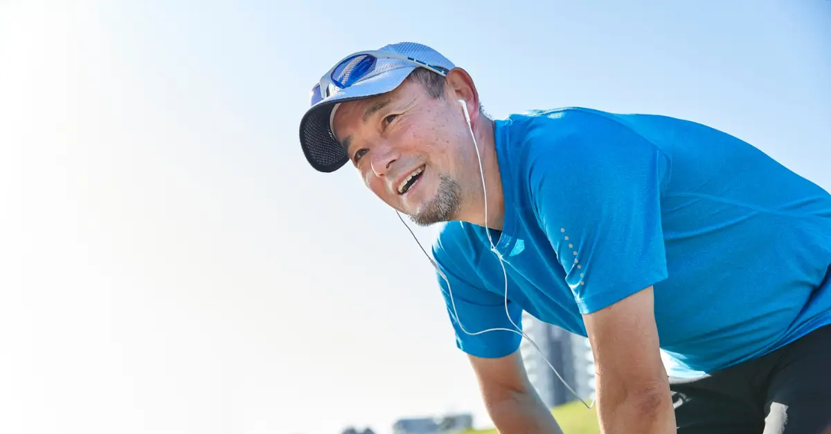 Active middle-aged man catching his breath after an outdoor workout, highlighting improved energy and lean muscle support from BHRT hormone therapy. Active middle-aged man catching his breath after an outdoor workout, highlighting improved energy and lean muscle support from BHRT hormone therapy.