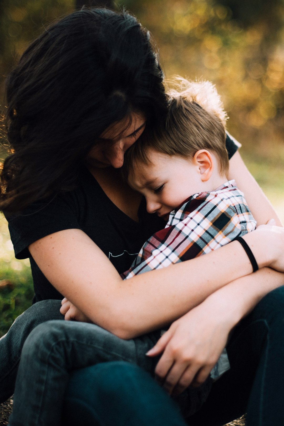 Mom nurturing and caring for her child, showing love, faith, and the importance of self-care for mothers. Mom nurturing and caring for her child, showing love, faith, and the importance of self-care for mothers.