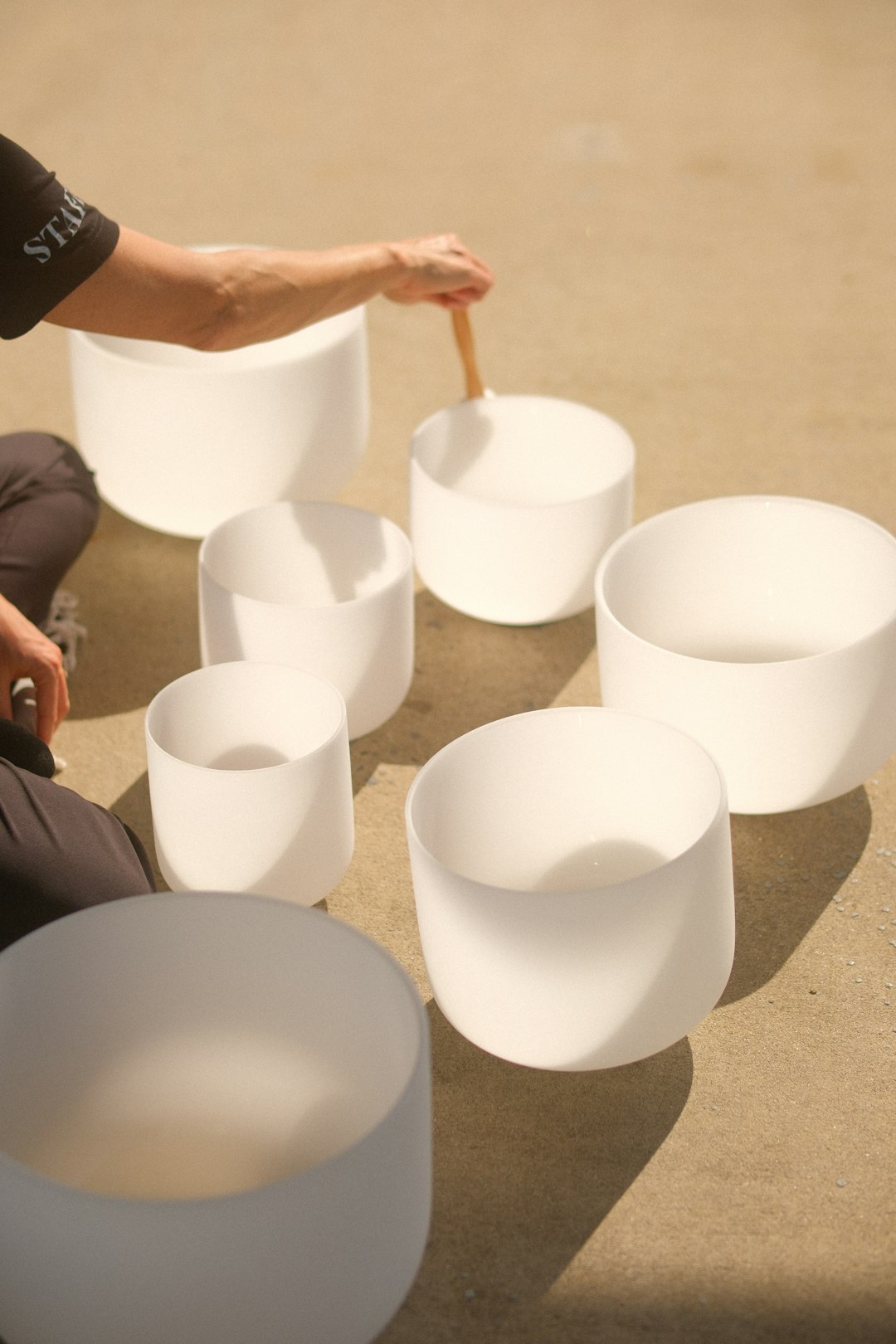 rystal singing bowls used for sound healing therapy to calm dysregulated nervous system and reduce anxiety
