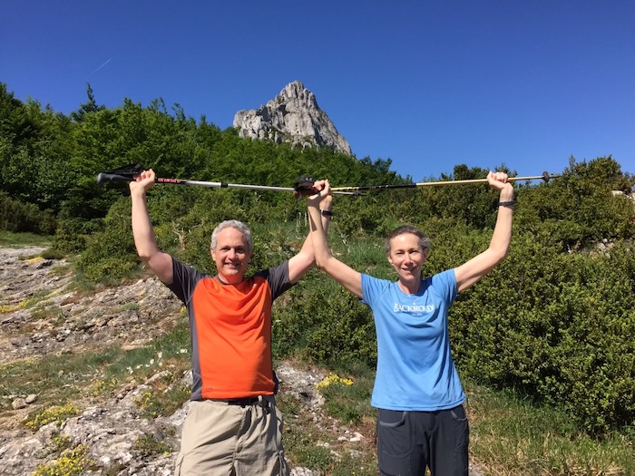 senior man and woman hiking