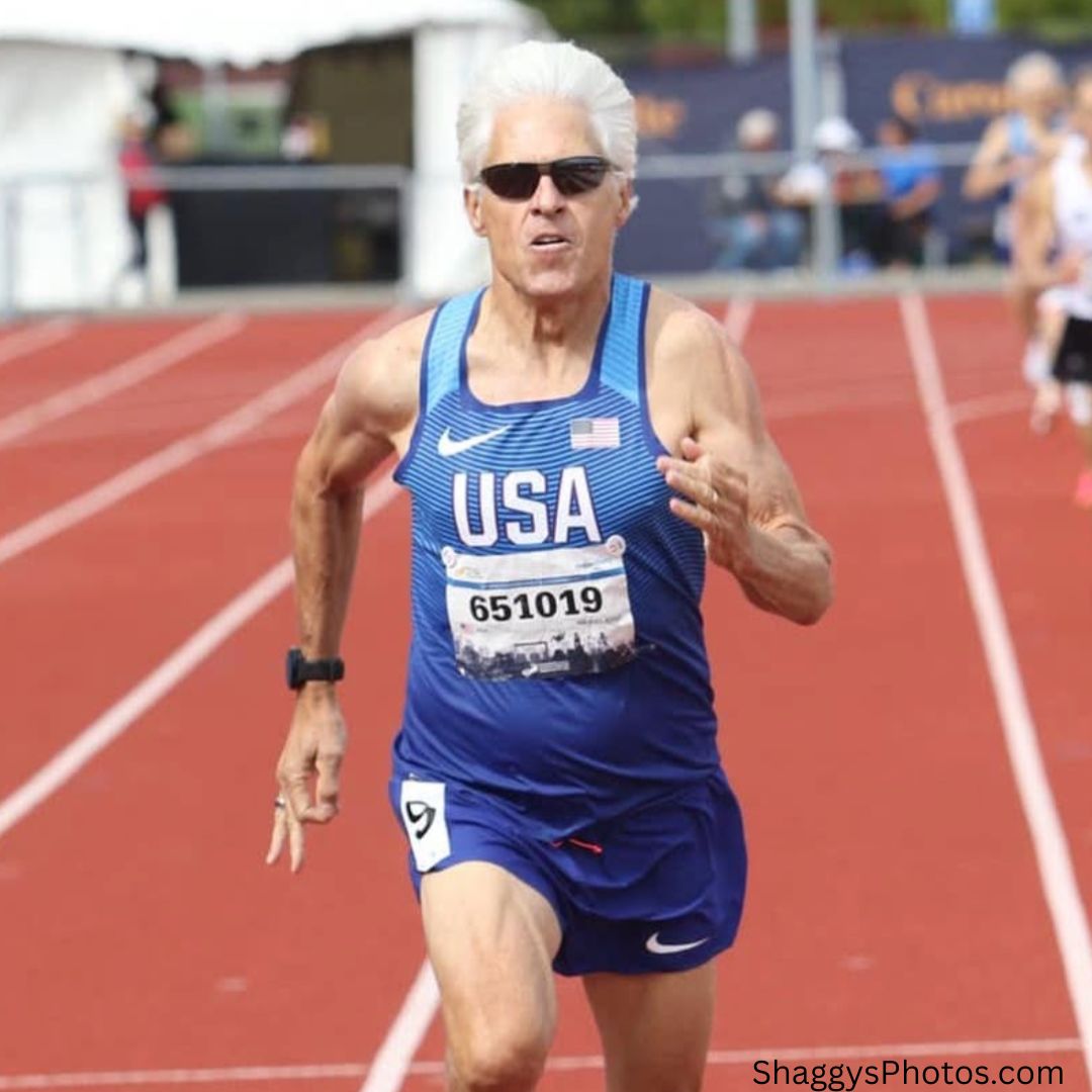 senior man competing in a running race