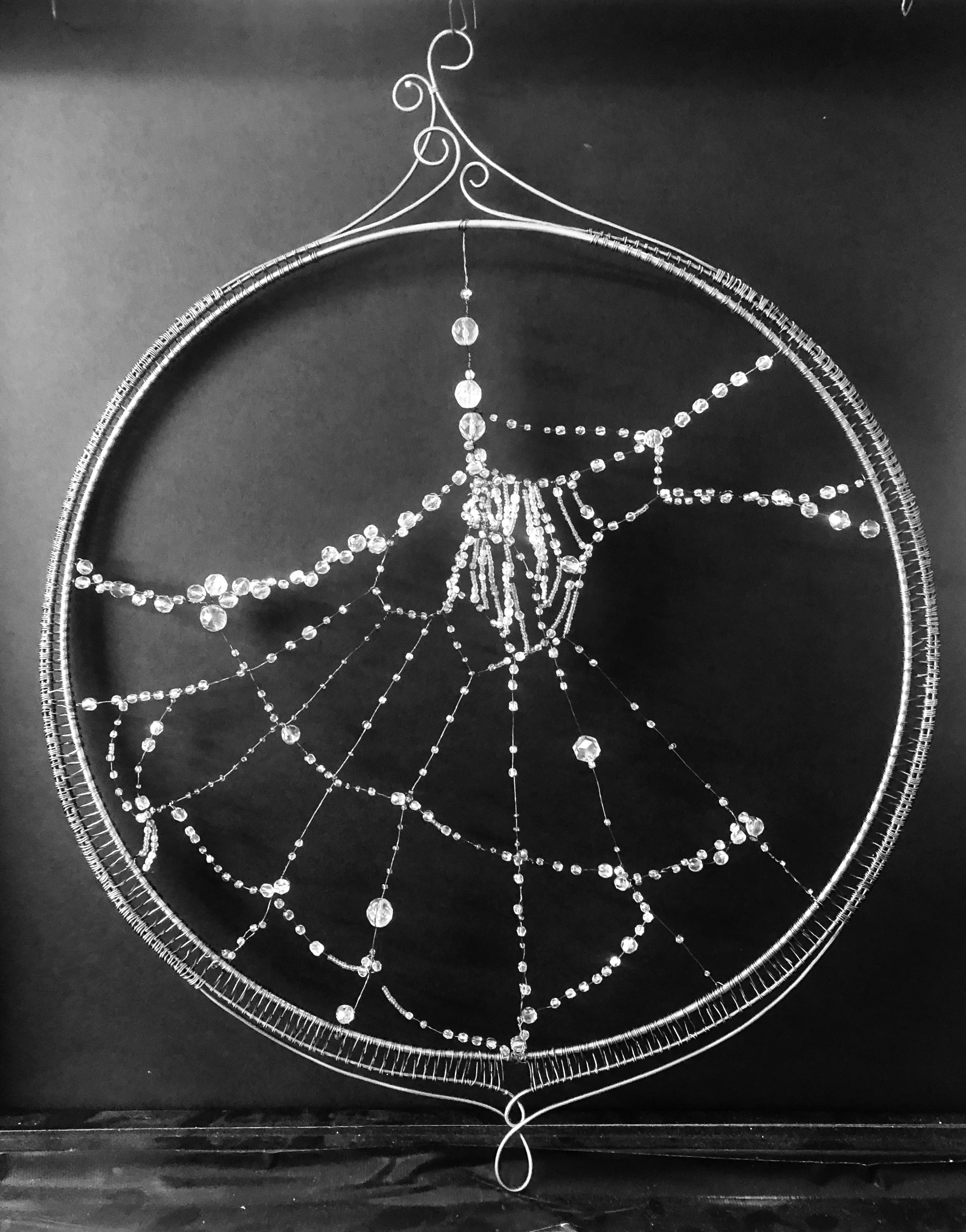 Framed wall sculpture, Webbed Dew. Steel wire and faceted glass by Damienne Dibble, 16" x 20" at Gallery Eleven, Charleston WV