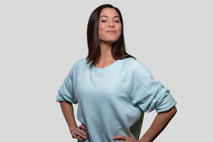 Confident woman standing proudly with hands on hips, symbolizing independence and emotional self-reliance after breaking free from the traditional autism support model. Confident woman standing proudly with hands on hips, symbolizing independence and emotional self-reliance after breaking free from the traditional autism support model.