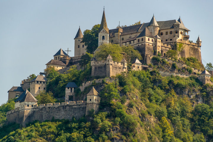 Medieval stone castle on a hilltop, symbolizing the layered structure of emotional resilience built through the Ultimate Divergence framework for autistic adults. Medieval stone castle on a hilltop, symbolizing the layered structure of emotional resilience built through the Ultimate Divergence framework for autistic adults.
