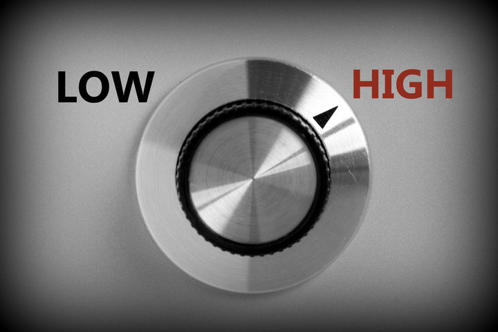 Metal dial turned toward high, symbolizing the shifting intensity of emotional triggers and nervous system responses in mild to severe autism. Metal dial turned toward high, symbolizing the shifting intensity of emotional triggers and nervous system responses in mild to severe autism.