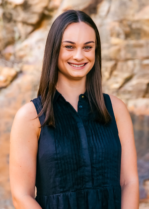 a medium shot of the Bluebird's Assistant Development Manager Rachel Madgwick wearing a navy-blue blouse