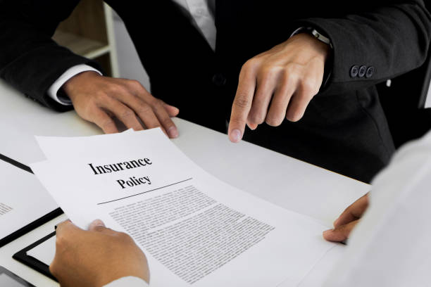 Insurance policy document with detailed insurance/legal terminology and conditions.