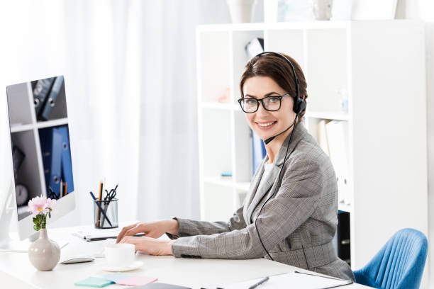 Entry-Level Life and Health Insurance Agent smiling at work