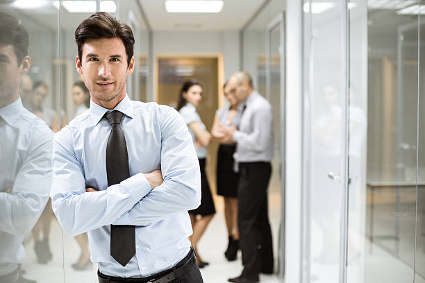 Professional insurance agent standing out in a crowd, symbolizing how to stand out as an insurance agent in a competitive job market.