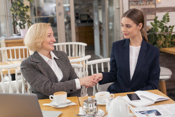 Female Part-Time Insurance Agent interacting with a business owner.