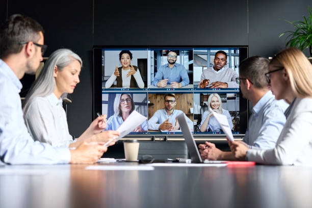 Life insurance agents communicating and learning about career opportunities.