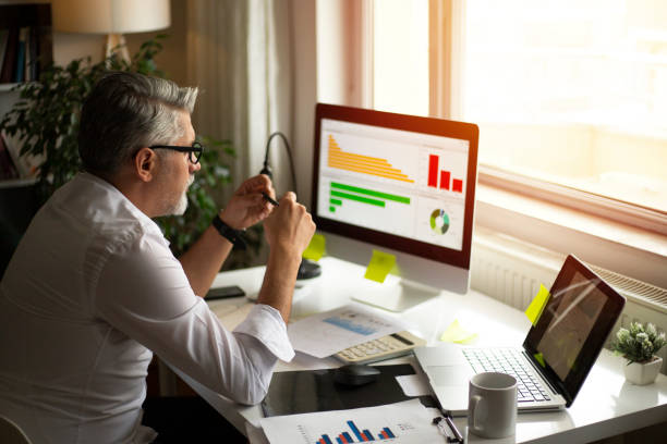  Independent insurance agent analyzing data to improve sales and customer service