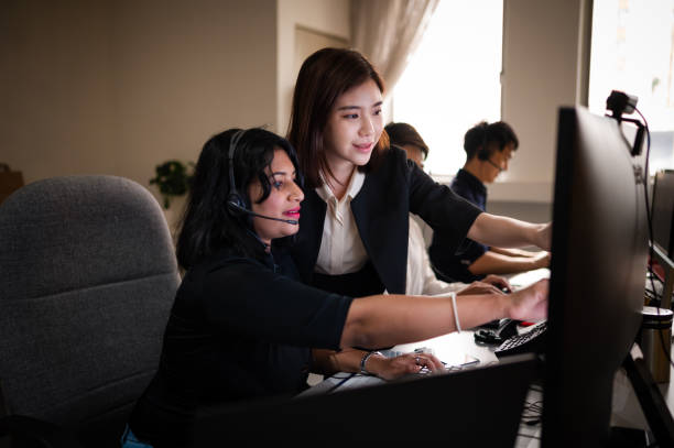 "Image of a person working remotely as a life and health insurance agent, using a laptop and headset, creating a professional and efficient work environment