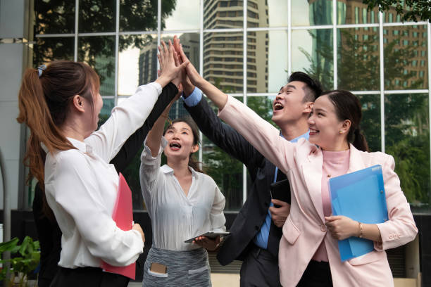 Teams Celebrating their Wins at Top Insurance Companies in 2023