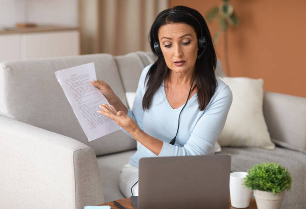 Female insurance agent taking online courses for continuing education.