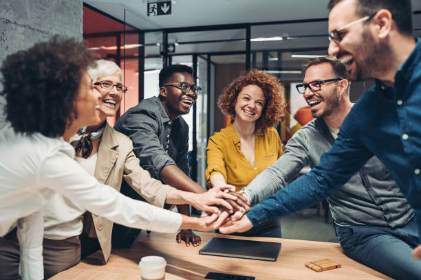 A diverse group of businesspeople discussing insurance policies.