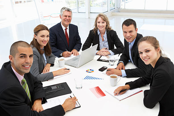 insurance agents gathered for a meeting