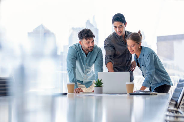  Insurance agents working together in a collaborative environment.