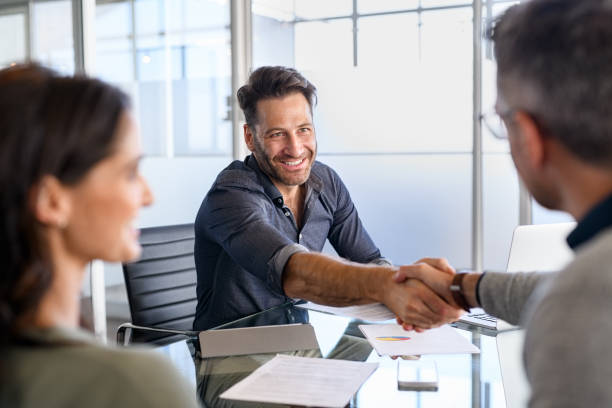 Insurance broker handshake.