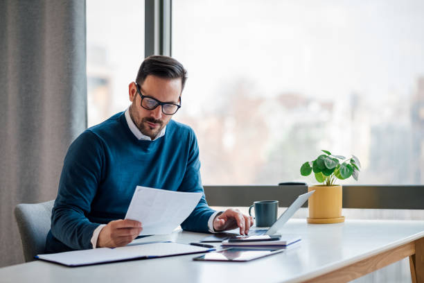  Insurance broker at the desk.