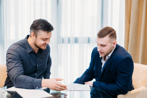 Independent insurance agent advising a client.