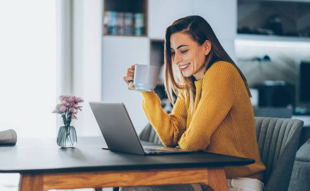 woman working remotely on laptop