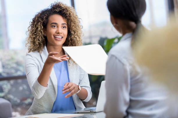 Insurance agent communicating with a client.
