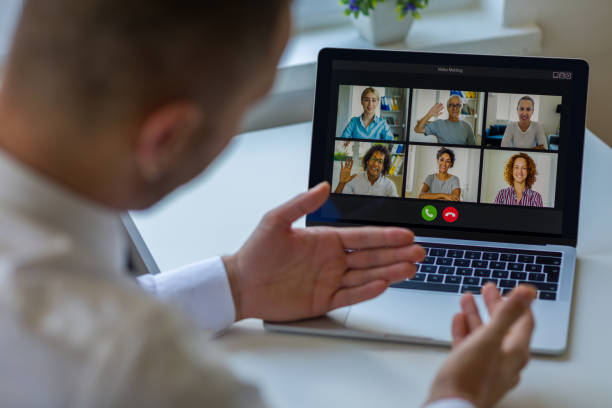 Remote insurance agents connecting in virtual meeting.